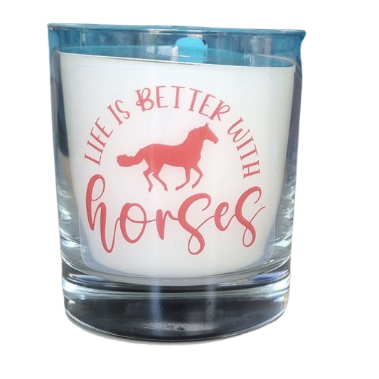 A scented Candle In Glass Container With Life Is Better With Horses and horse design in red