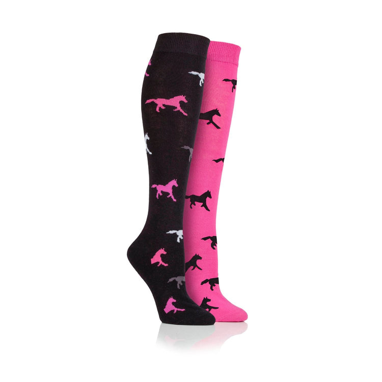 Two knee-high socks: one black with pink and white dog silhouettes, and one pink with black and white dog silhouettes. Both displayed upright on a white background.
