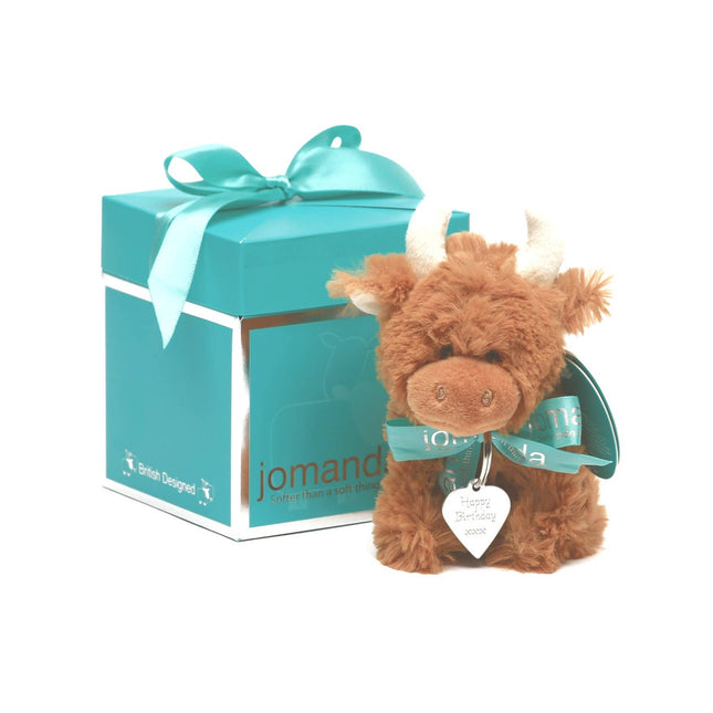 The Jomanda Soft Toys & Accessories Gift Box Pop-Up (10cm) features a plush highland cow with cream horns, teal ribbon, and a silver heart tag reading Happy Birthdayâ€”a perfect set for mini toy collectors or gifting. Suitable for mini toys or slippers.