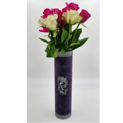 The Quaver&Lyric Wax Vase Tall Cylinder in purple with an aged silver effect holds pink and white roses with green leaves, creating a stunning home decor piece against a plain white background.
