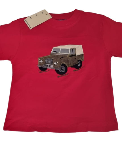The Ramblers Embroidered T Shirt Farm Vehicle Childrens features a red short-sleeve design with a brown and beige vintage Land Rover graphic on the front and a collar tagâ€”ideal for any kidâ€™s wardrobe.