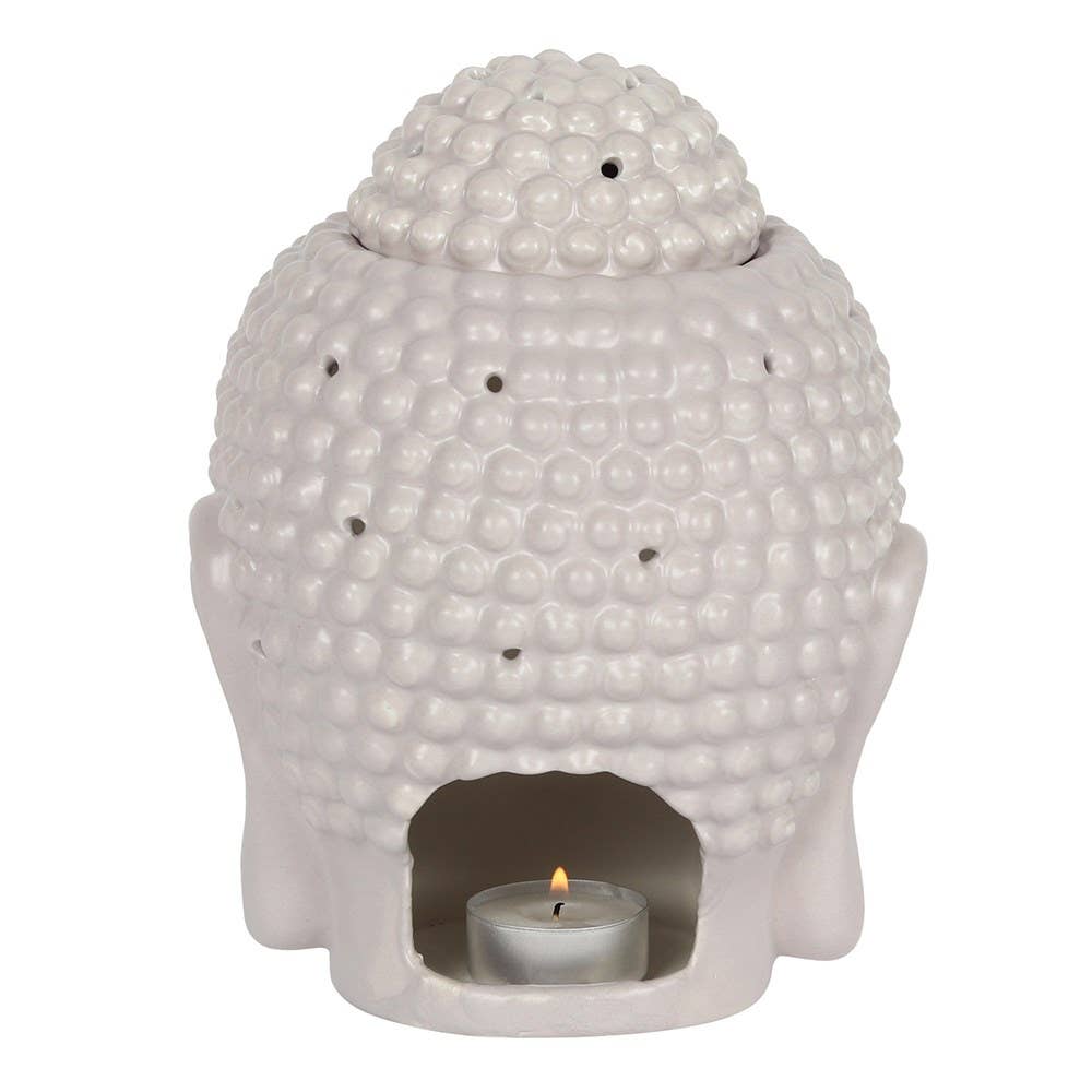 the back view of a light grey large buddha head wax warmer with a lit tealight inside