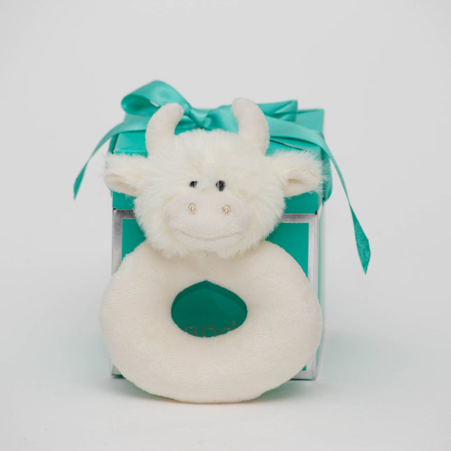 A soft, white Jomanda cow plush (10cm) sits before a teal-ribboned Gift Box Pop-Up by Jomanda Soft Toys & Accessories, perfect for mini toys or slippers, all on a plain white background.