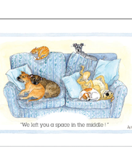 A cartoon blue couch packed with four dogs and a cat relaxing, with the text: We left you a space in the middle! Funny Cat Dog Coaster Left You A Space in the Middle by Alisons Animals—unique home decor or gift.