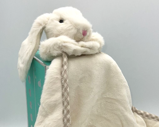 a cream fluffy bunny soft toy with floppy ears with a soft blanket comforter in a luxury gift box