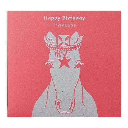 The Horse Greeting Card Happy Birthday Princess by Deckled Edge Ltd features a crowned horse with a star on its forehead and Happy Birthday Princess in white on a soft pink background, inspired by Janna Cossettini’s artwork.