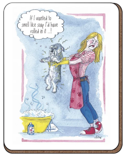 Funny dog coaster showing a woman holding her dog above a soapy bath. The woman is recoiling from the smell of the dog. Thought bubble above the dog says "if i wanted to smell like soap i'd have rolled in it.."