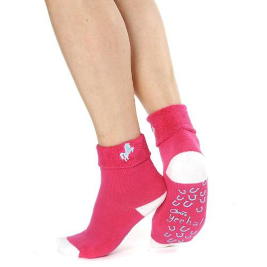 thick pink ankle socks with pale blue rearing horse motif and horseshoe rubber grip on the sole
