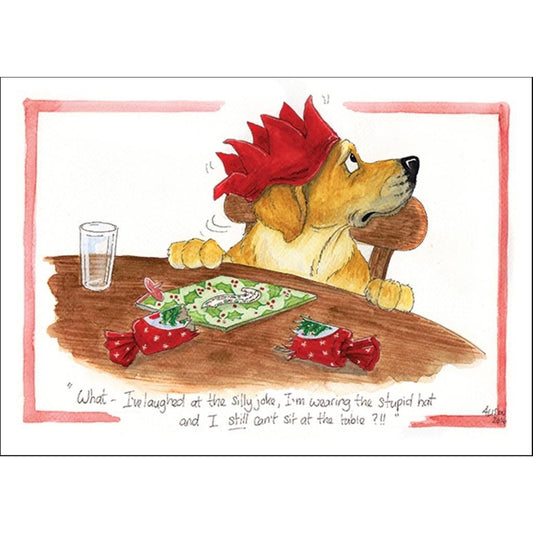 Funny dog Christmas card by Alisons Animals featuring a dog sat at the table on Christmas day wearing a paper crown and looking pleadingly for his Christmas lunch. 