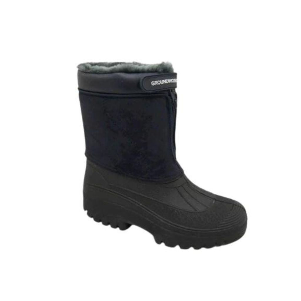 The side view of a navy blue mid calf length groundwork equestrian dog walking boot with waterproof synthetic lower and water resistant synthetic suede upper