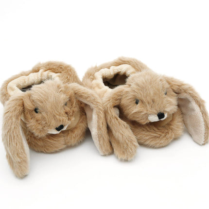 a pair of soft plush bunny rabbit  slippers for infants from Jomanda. Made of very soft brown plush fur with a cute cream plush  lined floppy ears and cream nose