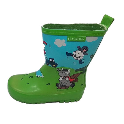 The Equinaliagifts Black Fox Kids Wellies Farm Theme Green are childrens natural rubber boots, featuring playful cartoon sheep and cow designs on a blue sky, for a fun farm look. The BLACKFOX logo appears near the top of the boot.