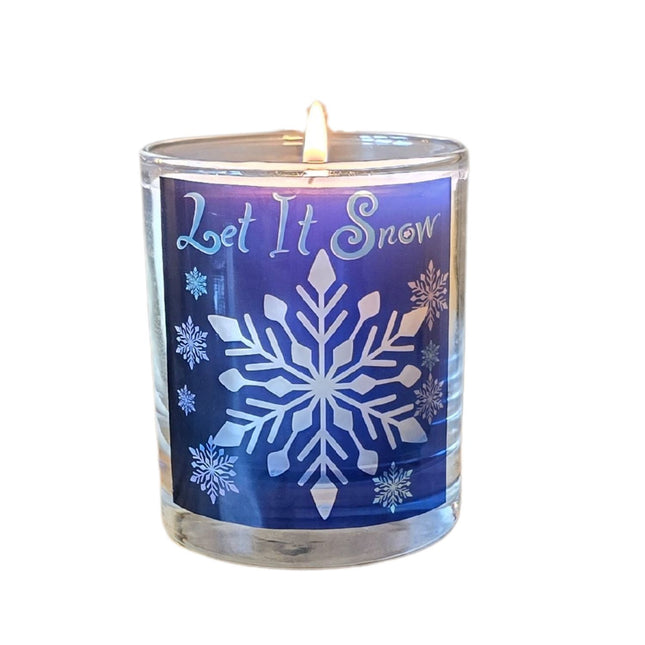 The Quaver&Lyric Christmas Scented Candle in a Let It Snow design glass container, adorned with white snowflakes, is perfect festive home decor and a great gift idea.