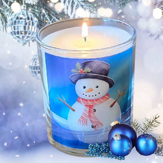 The Quaver&Lyric Christmas Scented Candle features a glass container with a cheerful snowman design, making it a festive home decor gift that adds cozy winter holiday vibes to any space.