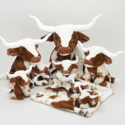 Texas Longhorn Cow Slippers For Infants from Jomanda Soft Toys & Accessories, featuring brown and white plush fur with big white horns, are grouped with the rest of the longhorn cow range perfect as a cute baby gift or cozy inspiration.