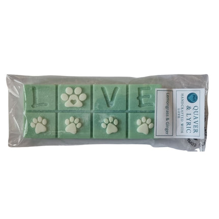 A green Scented Wax Melt bar with love and white paw prints