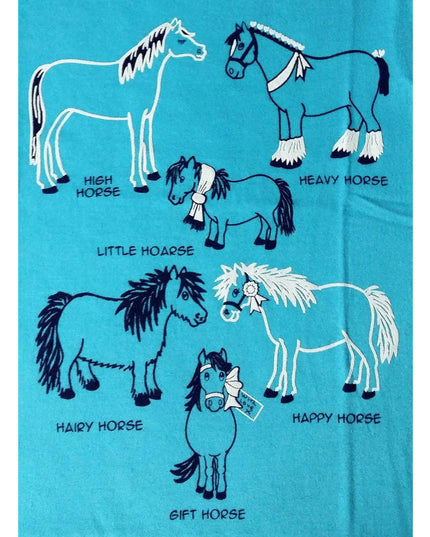 The Horse T Shirt Printed Azure Blue Childrens by British Country Collection showcases six quirky cartoon horsesâ€”High Horse, Heavy Horse, Little Hoarse, Hairy Horse, Happy Horse, and Gift Horseâ€”ideal for kids who love humor and unique designs.