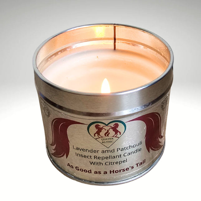 A Quaver&Lyric Insect Repellent Candle with Citrepel in Lavender & Patchouli, in a round tin featuring horse silhouettes and the phrase As Good as a Horses Tail, highlights natural ingredients.