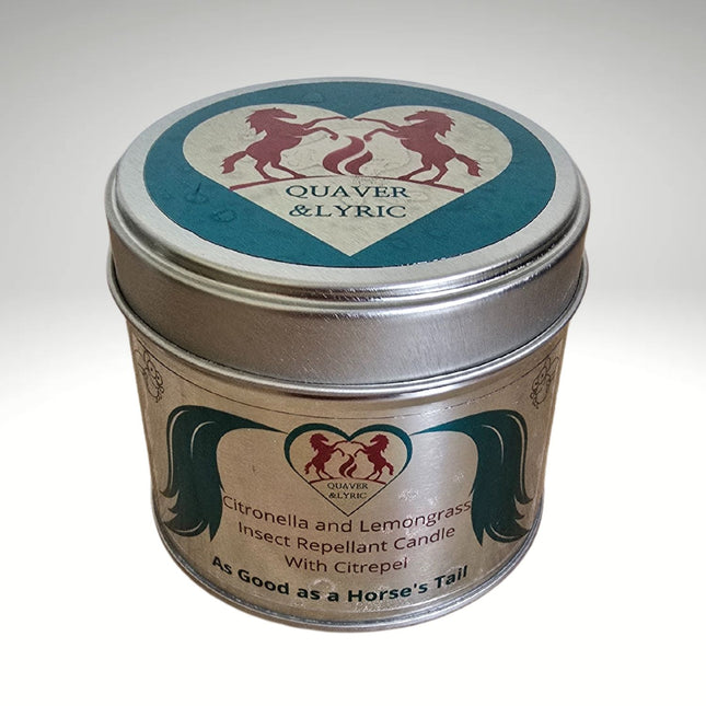 A metal tin from Quaver&Lyric holds an Insect Repellent Candle With Citrepel Citronella and Lemongrass, with all-natural ingredients. The lid shows two red horse silhouettes and the text: As Good as a Horses Tail.