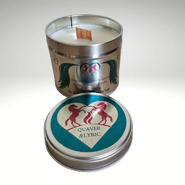 A round metal tin Quaver&Lyric insect repellent candle with a wooden wick and unicorn-printed lid. Made with natural Citrepel, citronella, and lemongrass, this candle helps keep bugs away.