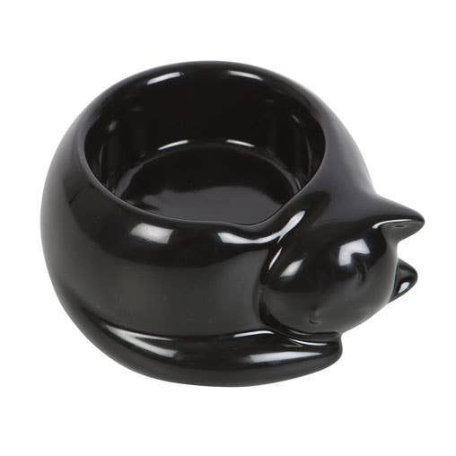 a black glossy tealight holder in the form of a curled up cat