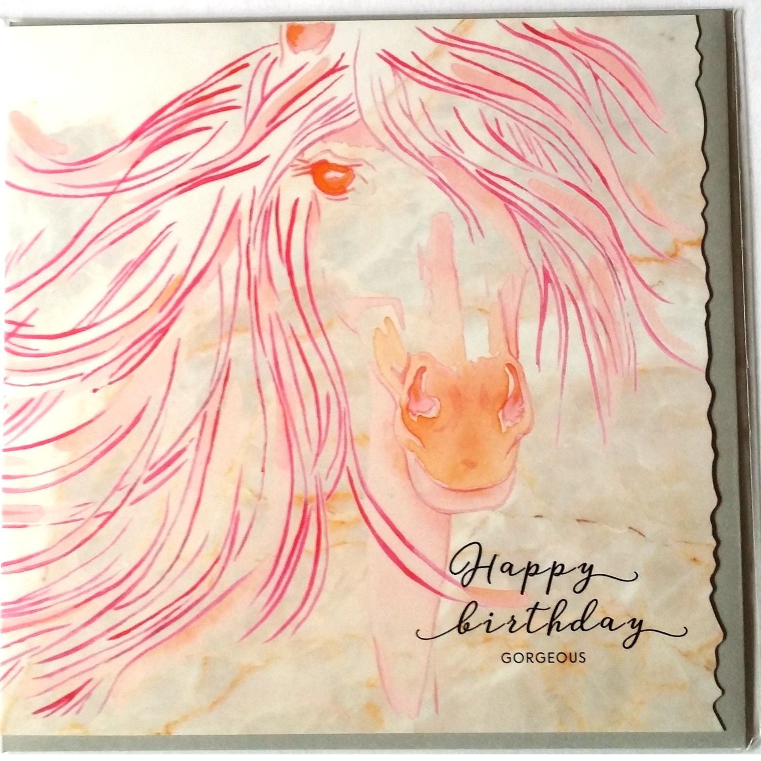 a square greeting card with a crinkled edge on one side featuring a beautiful horse with a flowing mane in pink and orange with wording on the outside Happy Birthday Gorgeous