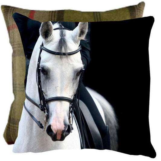 The Equinaliagifts Grey Dressage Horse Cushion Plaid Reverse features a close-up of a bridled horse with the rider subtly visible, set against a dark background—an elegant decor accent for any equestrian enthusiast’s home.