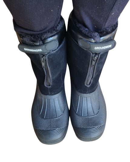 a pair of a mid calf length groundwork yard, equestrian, dog walking boot with waterproof synthetic lower and water resistant synthetic suede upper