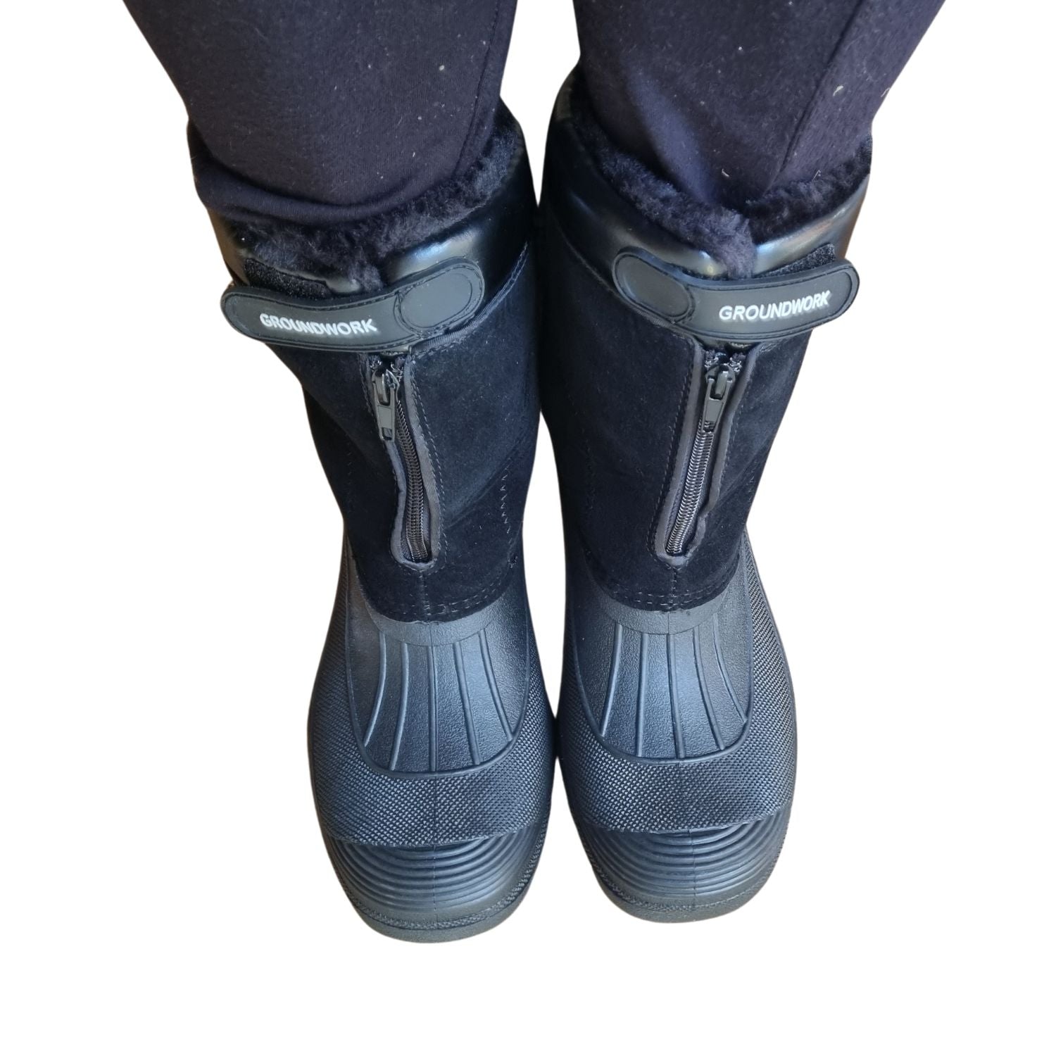 a pair of a mid calf length groundwork yard, equestrian, dog walking boot with waterproof synthetic lower and water resistant synthetic suede upper