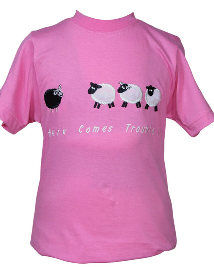The Ramblers Embroidered T Shirt Sheep Kids features a pink premium cotton fabric, three white sheep and one black sheep design, and Here Comes Trouble text beneath the playful embroidery.