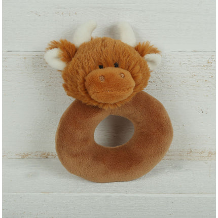 a donut shaped new baby rattle in brown soft plush fabric with a cute brown highland cows head with cream horns and ears