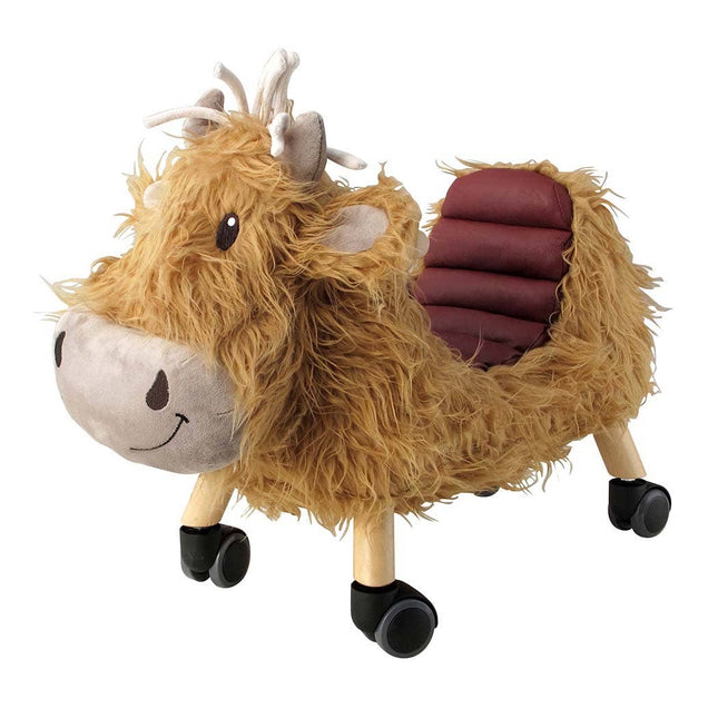 a gorgeous highland cow ride on toy with golden fur, a loveable smiley face, leatherette seat and multi directional castors