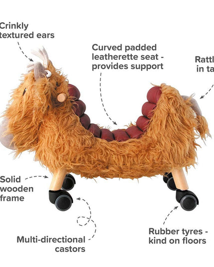 highland cow ride on toy image highlighting features of curved leatherette seat; multi directional castors, rubber tyres; rattle in tail; solid wooden frame; crinkly textured ears