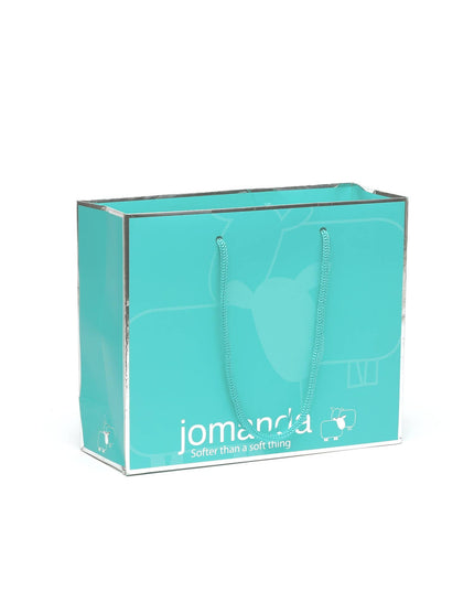 an aqua coloured gift bag with silver jomanda branding