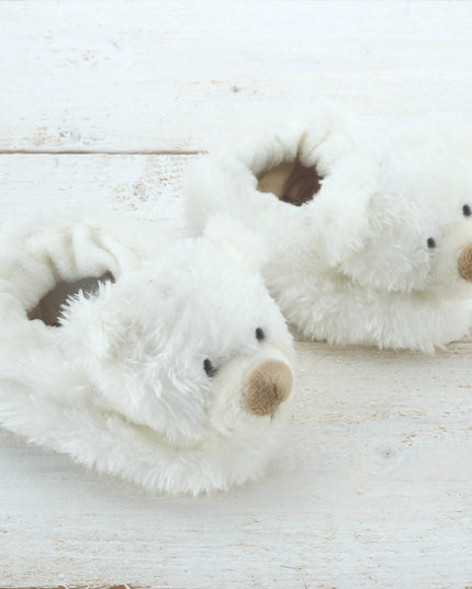 Jomanda Soft Toys & Accessories Teddy Bear Slippers For Infants are cream, soft plush baby booties shaped like bear facesâ€”an adorable baby shower or newborn gift, perfect for keeping tiny feet cozy.