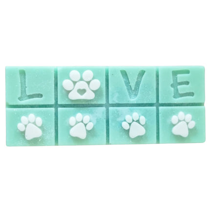 A green Scented Wax Melt bar with love and white paw prints