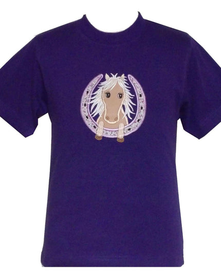 The British Country Collections Horse Embroidered T Shirt Childrens Purple Horseshoe features a cute cartoon horse with a light mane inside an embroidered horseshoe design on the chest.