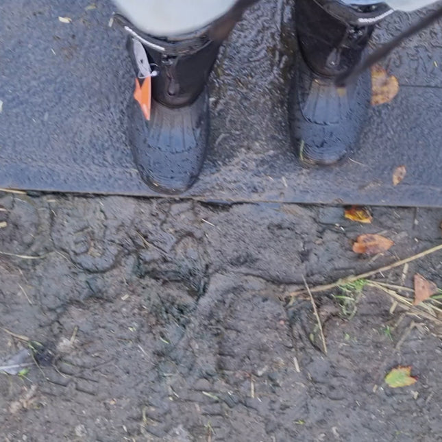 a pair of groundwork mucker dog walking boots being washed after use