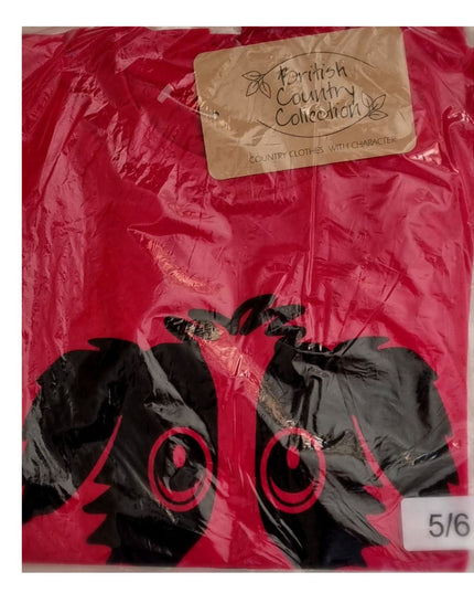 A red cotton Childrens T-shirt from British Country Collection, packaged in plastic, features a Rex the Dog cartoon design and a size sticker marked 5/6.