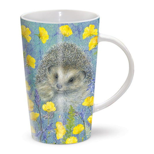 The Otter House Riverbank Enchanted Hedgehog Mug features a charming hedgehog among yellow flowers and green leaves on blue. This tall ceramic mug is both microwave and dishwasher safe, perfect for daily use.