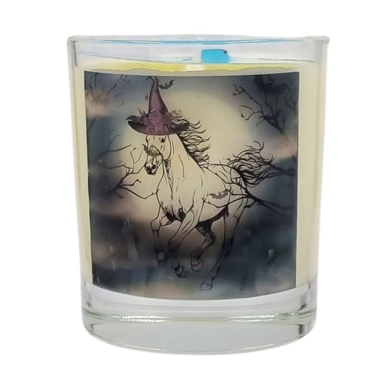 a scented halloween candle featuring a spooky galloping horse design