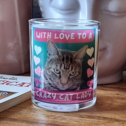 A Quaver&Lyric scented candle in a glass container featuring a Bengal cat and â€œWITH LOVE TO A CRAZY CAT LADY,â€ surrounded by colorful heartsâ€”perfect for gifting with books or premium fragrances.