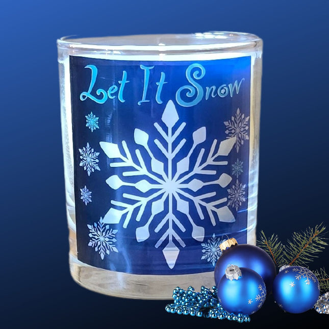 The Quaver&Lyric Christmas Scented Candle comes in a “Let It Snow” glass container with a white snowflake on blue—festive home decor perfect for displaying this holiday gift. Blue ornaments, beads, and pine branch not included.