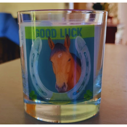 The Quaver&Lyric Scented Candle In Glass Container features a good luck horse and horseshoe design with shamrocks, ideal for gifting or pairing with premium fragrances or high quality wax blends.