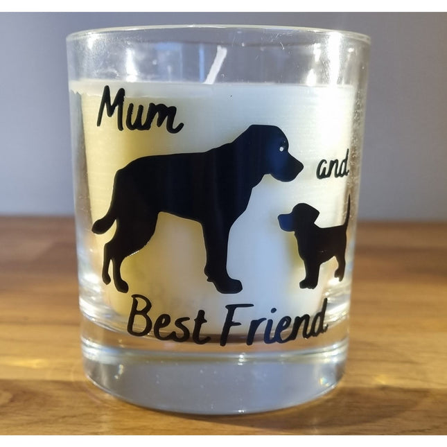 The Quaver&Lyric Scented Candle In Glass Container (20cl) features black silhouettes of a large dog and puppy, with Mum and Best Friend in cursive, making it a perfect gift for dog lovers. The white candle offers premium scents for any space.