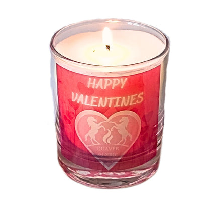 The Quaver&Lyric Scented Happy Valentine Candle comes in a 30cl glass container with a pink HAPPY VALENTINES label above a heart and two unicorns, handmade in Barton Seagrave with premium fragrances.