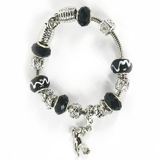 silver coloured rope bracelet with black and silver coloured beads and a horse charm