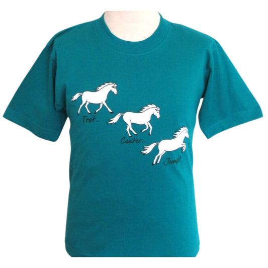 From British Country Collection, the Printed Horse T Shirt With Trot, Canter, Jump Design for children features a charming white horse in three playful posesâ€”Trot, Canter, and Jumpâ€”on a vibrant teal background.