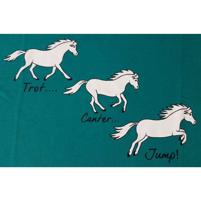 The British Country Collectionâ€™s Printed Horse T Shirt With Trot, Canter, Jump Design for children features three white horses showing different gaits on a teal backgroundâ€”a playful and charming addition to any young horse loverâ€™s wardrobe.