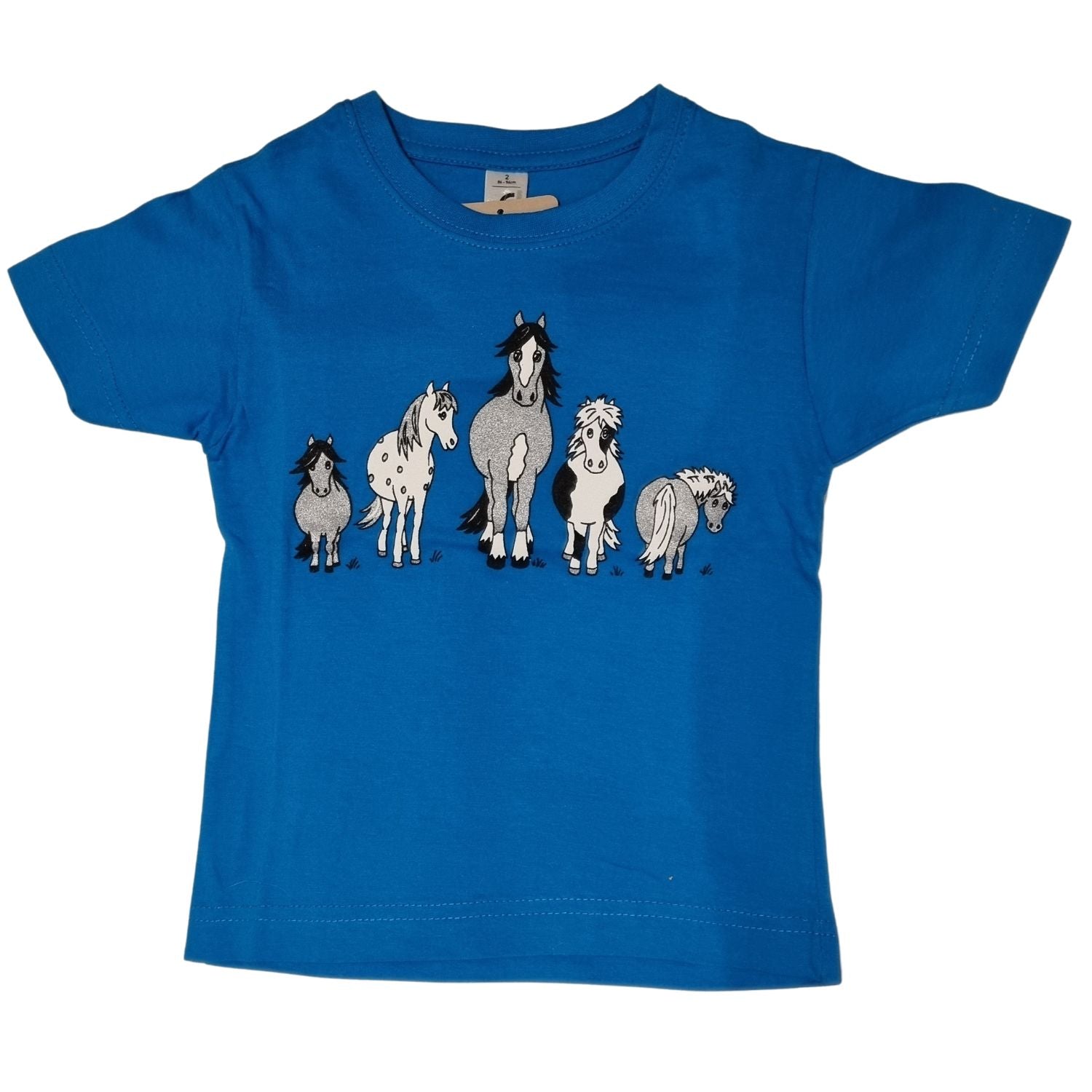 The British Country Collection Childrens T Shirt Printed The Herd Horse Design is a bright blue 100% cotton tee with playful horse illustrations across the chest. Machine washable for easy care.